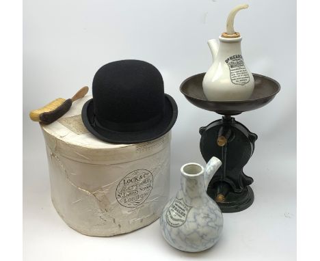 A boxed Lock &amp; Co Hatters St James St London bowler hat, together with a set of Salters cast iron scales with circular br