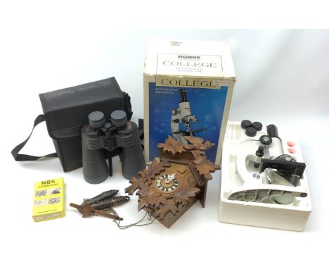 A boxed Konus College microscope, with a small selection of slides, together with cased pair of Sunagor Mega Zoom 150 binocul