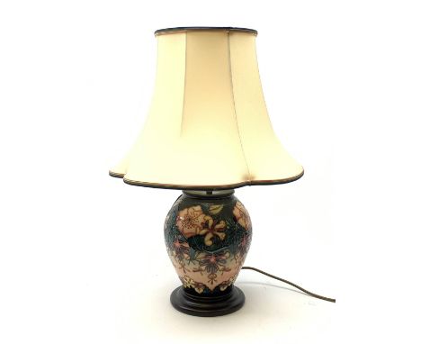 A Moorcroft Oberon pattern lamp, designed by Rachel Bishop, of baluster form and raised upon a circular stepped base, with cr
