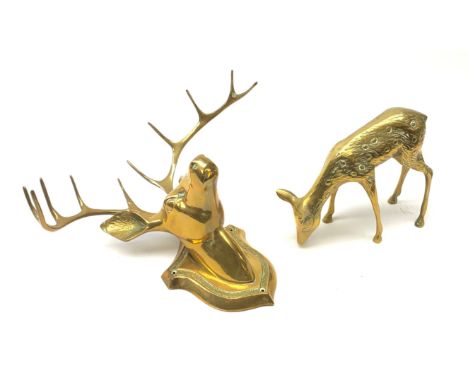 A brass wall mounted stags head, H29cm, together with a brass model of a fawn, H17cm.  - Condition Report 