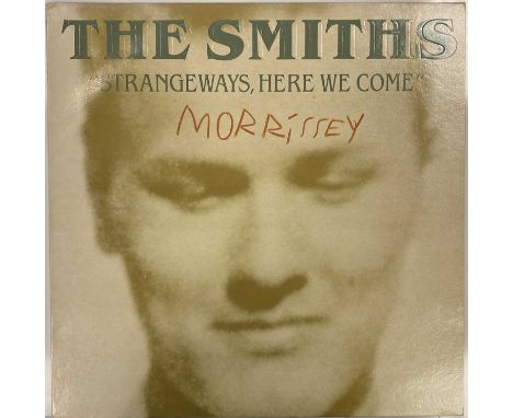 A copy of The Smiths - Strangeways Here We Come (ROUGH 106, VG/VG+) signed to sleeve clearly by Morrissey. Includes signed LO