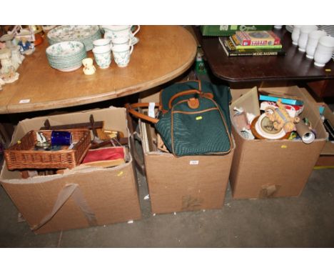 Three boxes containing various sundry items including thimble racks, bag, cat ornaments and prints etc 