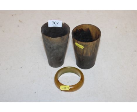 Two horn beakers together with a bangle