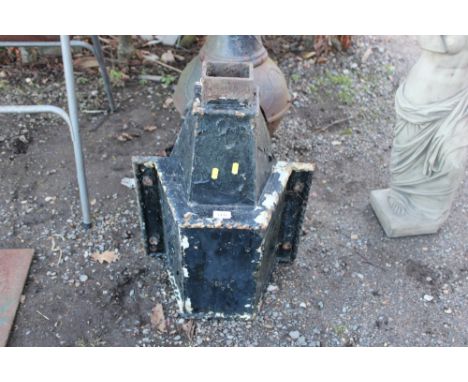 A large cast iron rain hopper