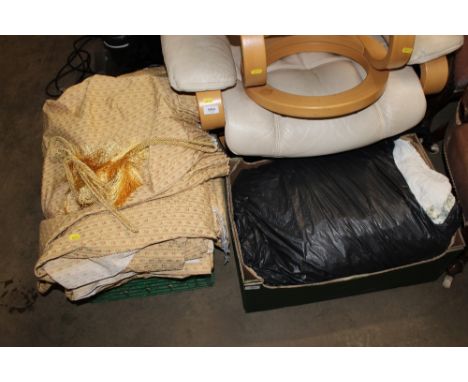 Two boxes containing various curtains and fabric