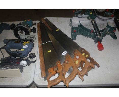 Three vintage Spear & Jackson hand saws together with one other