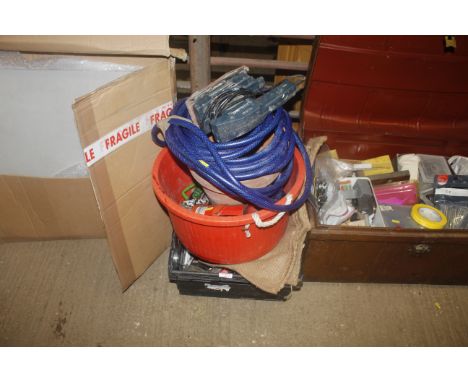 A quantity of various items, to include garden hose, plastic plant pots, a terracotta plant pot, plastic trug, hessian sacks,