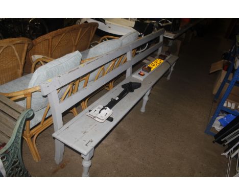 A long painted wooden bench measuring approx. 102" wide