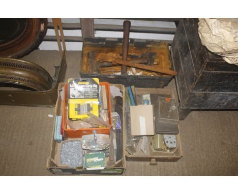 A plastic tool box containing various tools; to include mini sledge hammer, hammer, pipe wrench and two boxes of various fixi