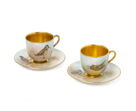 A PAIR OF ROYAL WORCESTER COFFEE CUPS AND SAUCERS
Painted with a snipe; a woodcock; a pheasant and a golden plover, all title