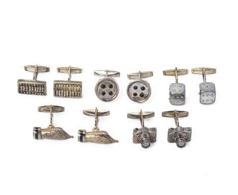 FIVE PAIRS OF NOVELTY SILVER CUFFLINKS
Comprising: dice; pen nibs; cameras; abacus; and buttons 
All marked  925
The abacus 2