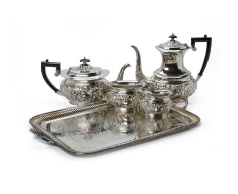 A LATE VICTORIAN SILVER PLATED TEA, COFFEE SERVICE AND TRAY Comprising a coffee pot, teapot, milk jug, sugar bowl with repous