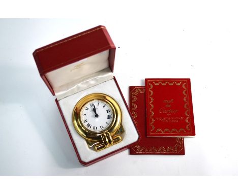 A Cartier Colisee gilt and lacquer travel alarm strut clock, no. 0500244 circa 1980, in fitted boxGood condition - cannot con