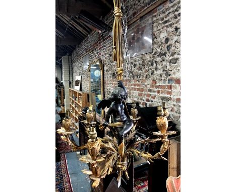 A good 19th century ormolu and brown bronze six branch electrolier/chandelier in the Rococo style, centred by a winged putto,