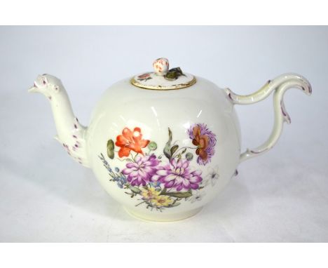 An 18th century Zurich porcelain bullet-shaped teapot with strawberry finial and scroll handle (animalier spout a/f) finely p