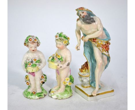 A porcelain Four Seasons figure, 'Winter' as an old man with floral-decorated cloak, on square base, 14 cm high, to/w two 18t