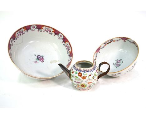 Two Chinese, famille rose punch bowls, both decorated with floral designs, the larger 26 cm diameter and the smaller 19.5 cm 