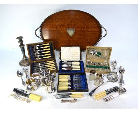An Edwardian oak oval tray with electroplated gallery and twin handles, to/w an Arts &amp; Crafts style electroplated three-p