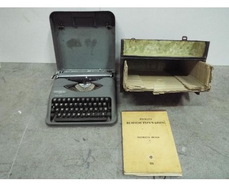 Pitmans Swiss Typewriter with Hellioue typewriting course book. Vintage. Case is 33cm wide.