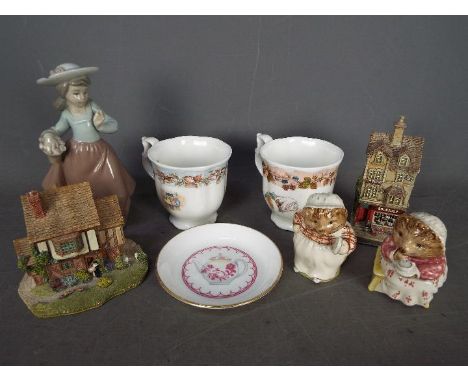 A small mixed lot to include two Brambly Hedge beakers, Autumn and Winter, two Royal Albert Beatrix Potter figurines, Mrs Tig