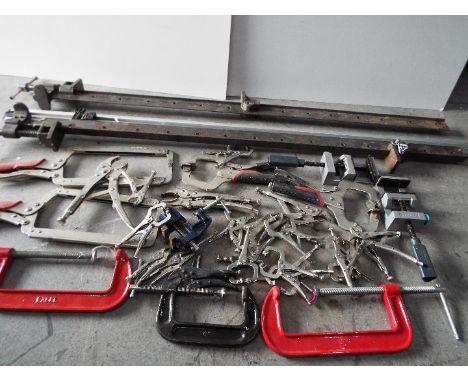 Clamps, Quantity, related tools. The longest is 126cm.Lot descriptions reflect the cataloguer's opinion only and do not const