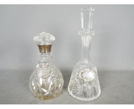 A George V cut glass decanter with hallmarked silver mount, Birmingham assay 1913, sponsors mark for John Grinsell & Sons, on