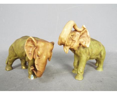 Two Royal Dux elephant figurines, unmarked, largest approximately 13 cm (h). [2]Condition Report: Elephant with the raised tr