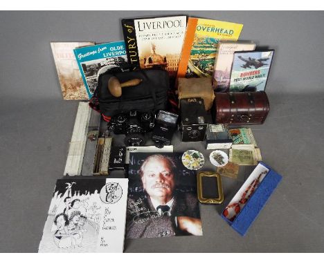 A mixed lot to include a compositor's stick used in letterpress printing, a slide rule, a Brownie Junior SIX-20 box camera in