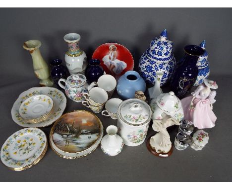 A mixed lot to include Cloclough tea ware, Oriental vases, Sylvac poodle, Copeland Spode globular vase decorated with prunus,