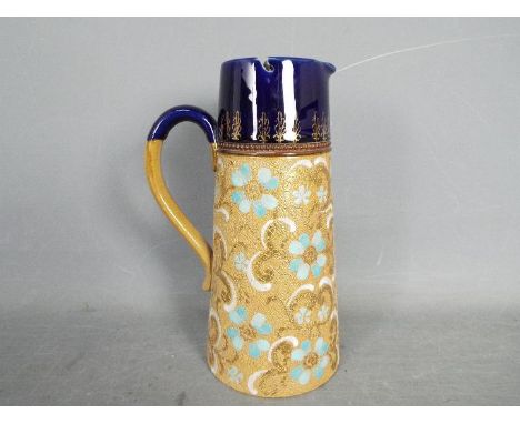 Doulton - a ceramic and pewter jug, approx 22 cm Lot descriptions reflect the cataloguer's opinion only and do not constitute