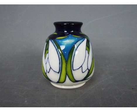 Moorcroft - a ceramic Forde vase, approx 6 cm Lot descriptions reflect the cataloguer's opinion only and do not constitute a 