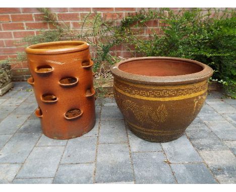 A salt glazed stoneware strawberry pot, 48 cm (h) x 35 cm (diam) and a large stoneware planter, 37 cm (h) x 51 cm (diam)  [2]