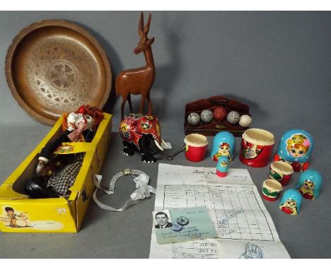 A mixed lot to include treen, boxed Pelham Puppet 'Bimbo', golf ball letter rack and similar.Lot descriptions reflect the cat