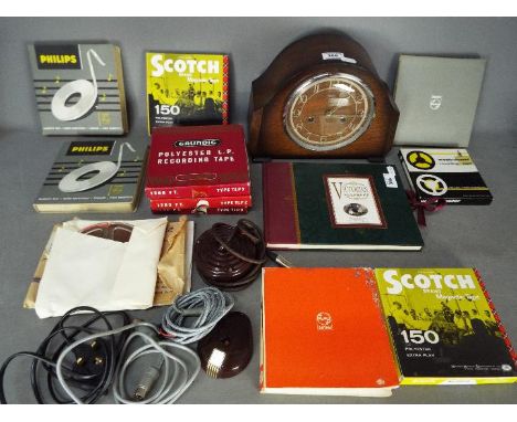Lot to include a Smiths Enfield oak cased mantel clock, with key, a quantity of reel to reel magnetic tape reels and a 'Victo