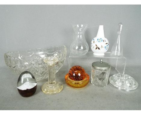 Lot to include a controlled bubble paperweight and similar bowl, Caithness paperweight, columnar candlestick and similar.Lot 
