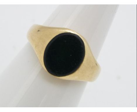 A 9ct yellow gold, stone set signet ring, size K, approximately 4.2 grams all in.Lot descriptions reflect the cataloguer's op