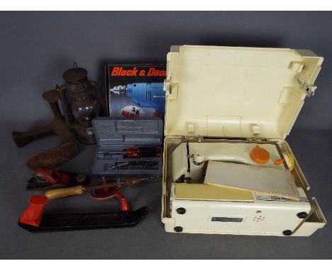 Lot to include tools, oil lamp and a Frister Rossman Cub 4 sewing machine. [2]Lot descriptions reflect the cataloguer's opini