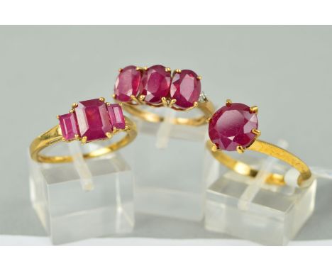 THREE 9CT GOLD MODERN ASSORTED GEM SET DRESS RINGS to include a large single stone composite, glass filled ruby, ring size S,