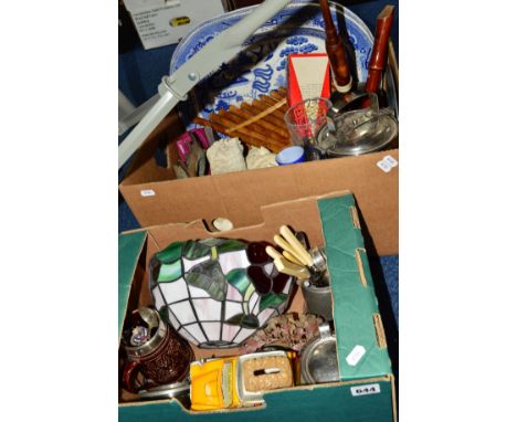 TWO BOXES OF SUNDRY ITEMS, to include Tiffany style lamp shade, musical instruments, novelty money bank (Reliant Robin), meta