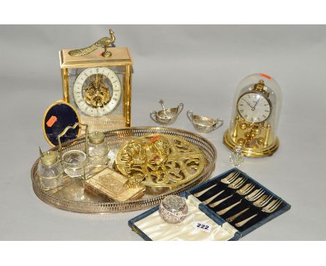 A SILVER TOPPED GLASS JAR AND A SILVER TOPPED TOILET BOTTLE, together with a Kundo anniversary clock, a London Clock Company 