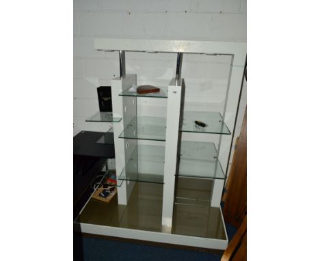 A DECORATIVE OPEN SHOP DISPLAY with various glass shelves and lighting, width 135cm x depth 91cm x height 170cm