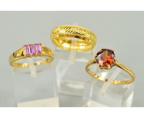 THREE RINGS to include a band ring with diamond engraved detail to the centre band, stamped 9k, ring size N 1/2, a circular s
