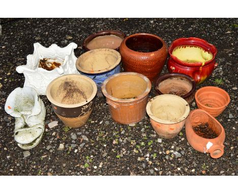A COLLECTION OF CERAMIC GARDEN PLANT POTS to include three glazed, two terracotta and six other, together with a cast iron pl
