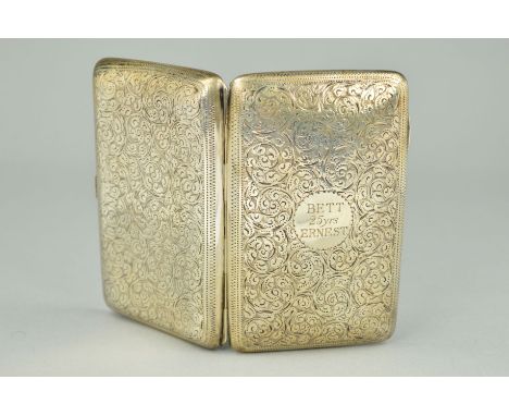A LATE VICTORIAN SILVER CIGARETTE CASE of rectangular outline with engraved scrolling acanthus leaf decoration and personal e