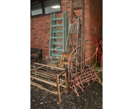 A PAIR OF LARGE WOODEN PAINTED TRESSLE STANDS and four others, five wooden step ladders, wooden shelving unit  (12)