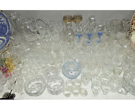 A QUANTITY OF CUT GLASS etc to include drinking glasses, bowls, vases and a tapering slab sided decanter