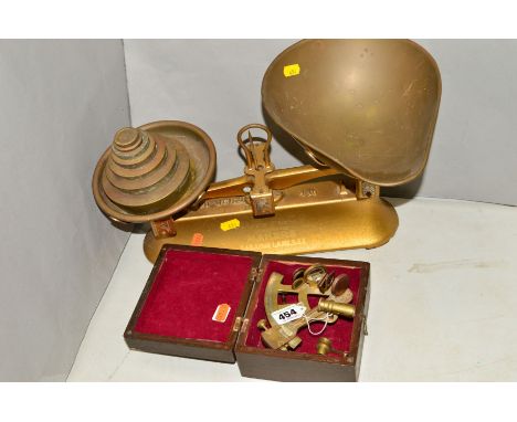 A HUNT &amp; CO (LONDON) SET OF SHOP SCALES, with weights, with an unmarked replica cased brass sextant (2)