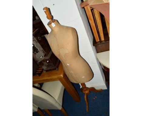 A 20TH CENTURY BEECH FRAMED SHOP FRONT MANNEQUIN on a tripod stand together with two pine framed tile plaques (3)