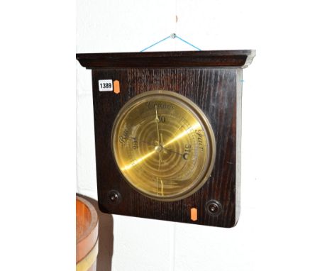 AN EARLY 20TH CENTURY OAK SQUARE FRAMED BAROMETER (sd to glass)