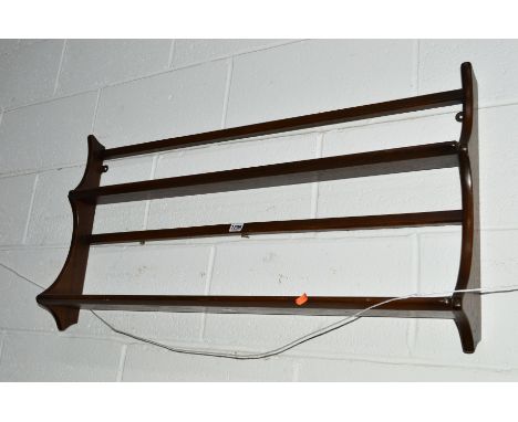 A DARK ERCOL WALL MOUNTED PLATE RACK